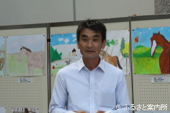 あいさつする平取町軽種馬生産振興会中田亨会長