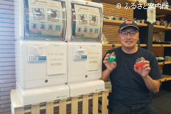 缶バッジをPRするアロースタッド副場長の藤田誠氏
